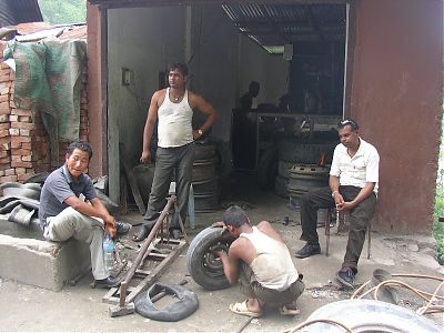 waiting for the tire to be changed